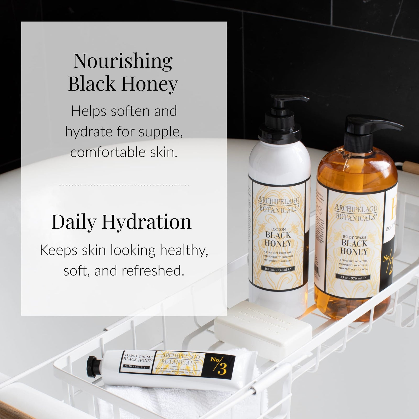 Two bottles of Black Honey Body Lotion and a small tube are arranged on a white bath tray over the bathtub. The scene highlights the lotion’s nourishing and daily hydrating benefits for soft, healthy skin. Against a black tile backdrop, the display enhances the luxurious appeal of Black Honey Body Lotion. - image 6