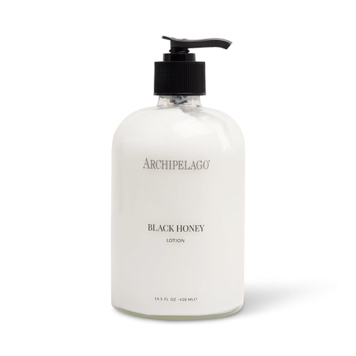 Black Honey Lotion in a glass bottle on white background.