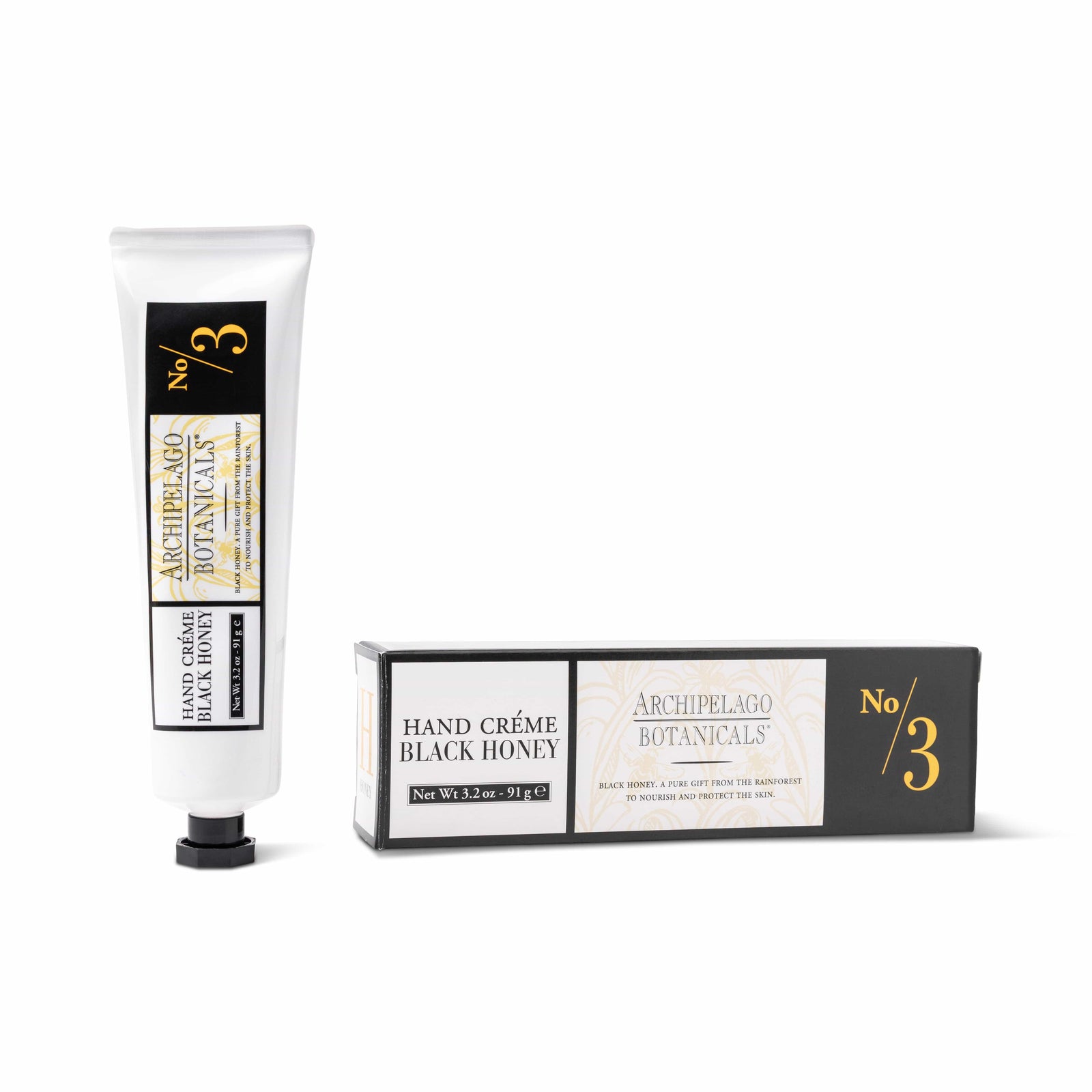 A tube and box of Black Honey Hand Creme are displayed side by side, both adorned with black, white, and gold labels—an elegant choice for luxurious hand and cuticle care. - image 1