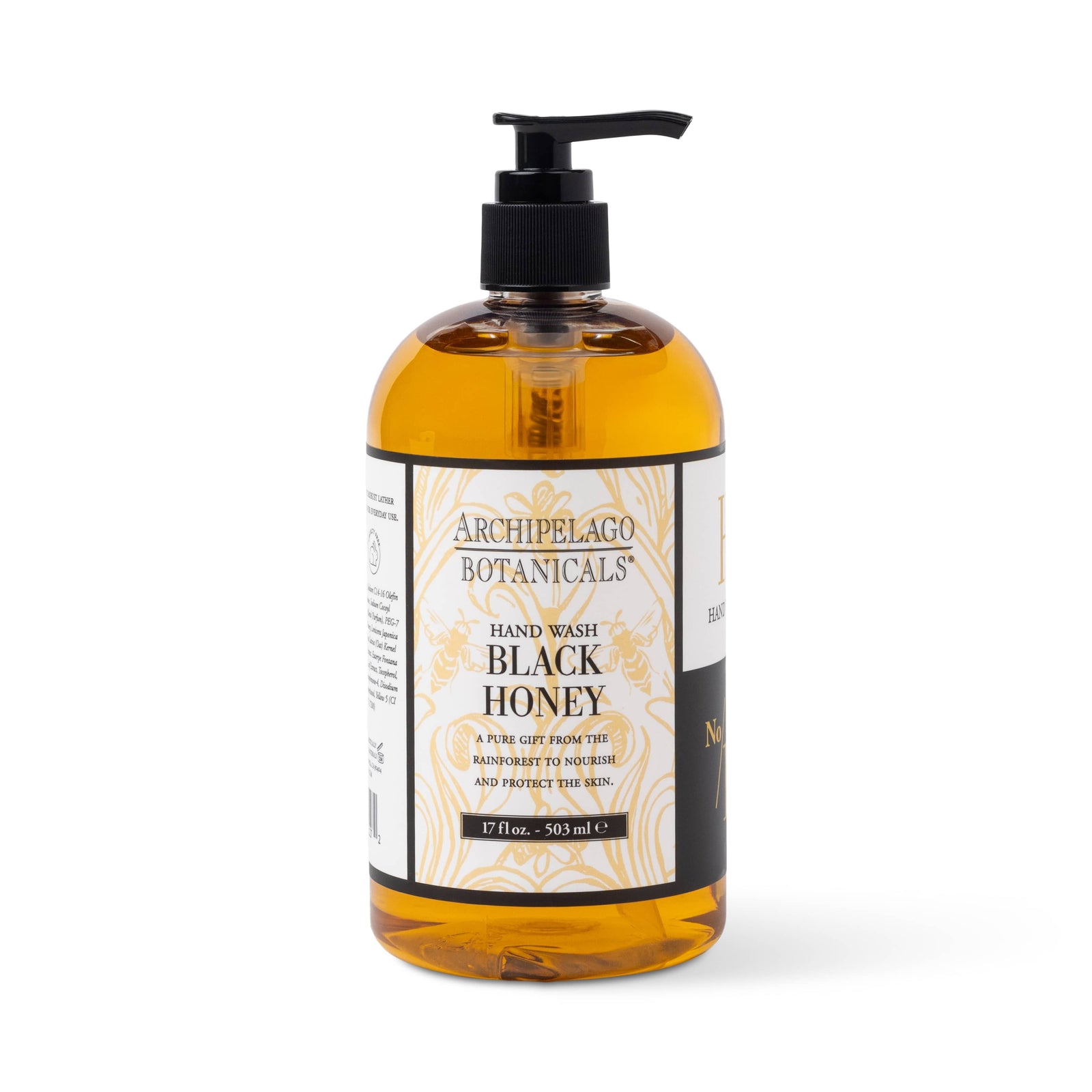 The Black Honey Hand Wash comes in a clear plastic pump bottle with gold and white designs, holds 17 fl oz (503 ml) of golden-yellow liquid, is paraben-free, and contains a natural humectant for soft skin. - image 1