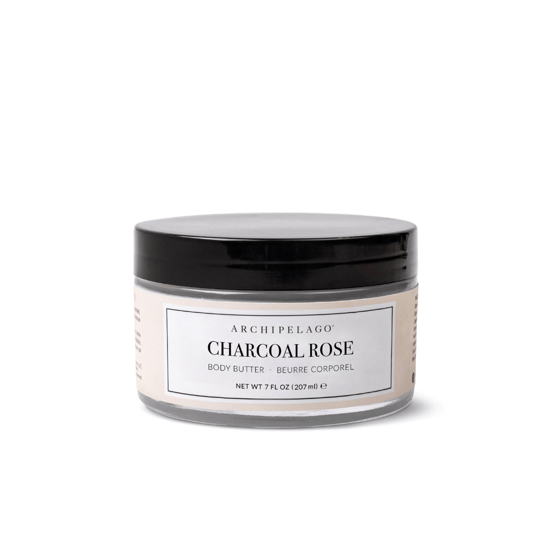 Charcoal Rose Body Butter in a 7 fl oz (207 ml) jar features a black lid, white label, and contains Activated Charcoal for deep hydration. - image 1