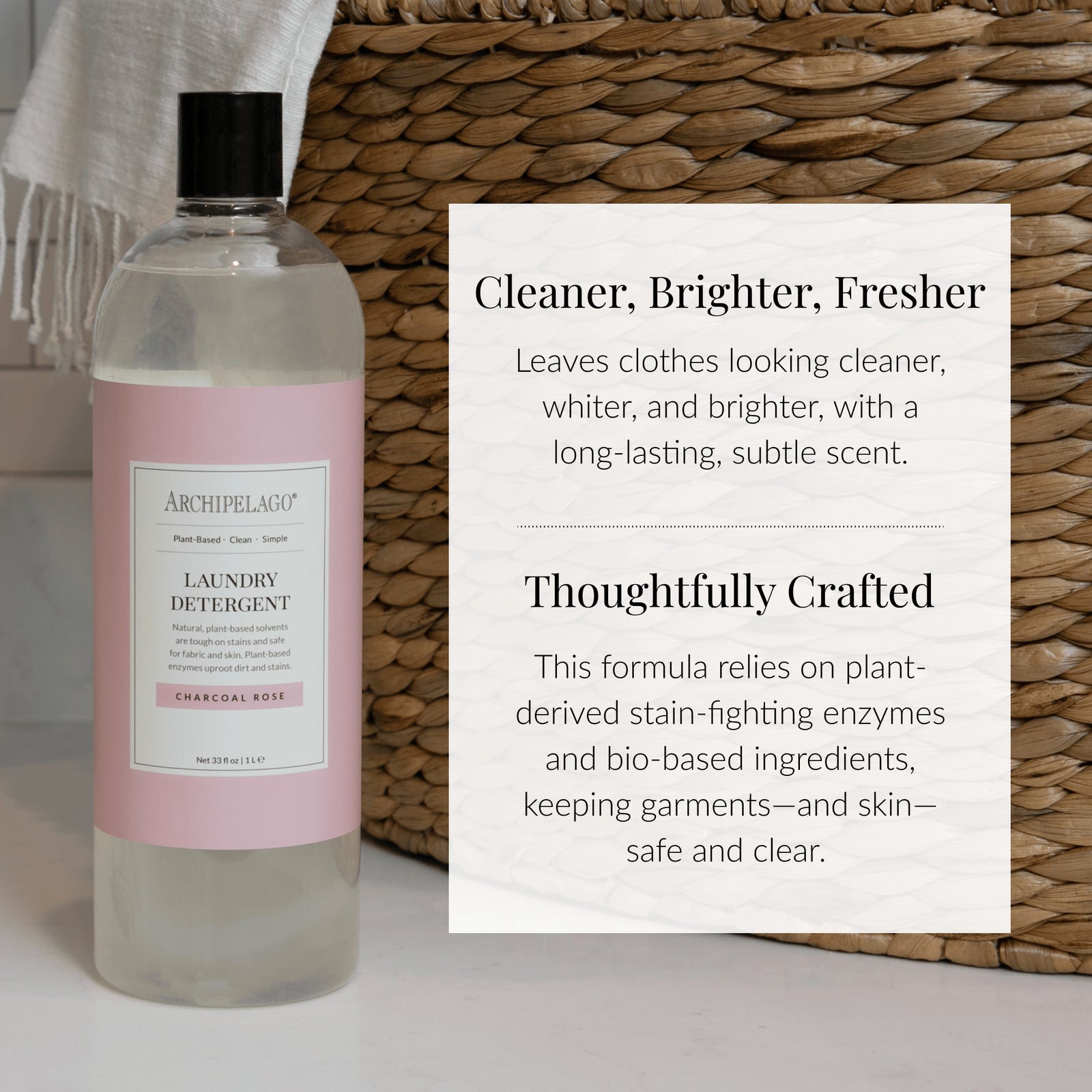 A bottle of Charcoal Rose Laundry Detergent sits by a woven basket, with overlaid text highlighting its cleaner, brighter laundry results and thoughtfully crafted stain-fighting formula. - image 4