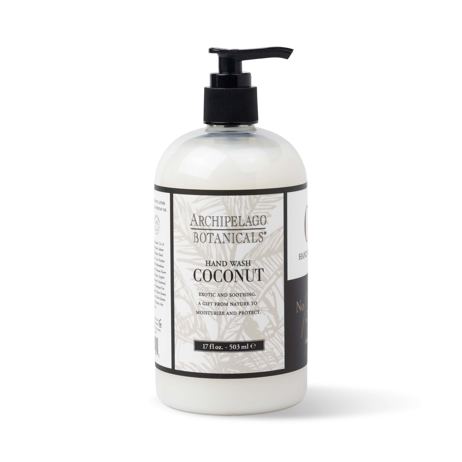 A 17 fl oz (503 ml) clear plastic pump bottle of Coconut Hand Wash, enriched with coconut oil, featuring a black and white label design. - image 1