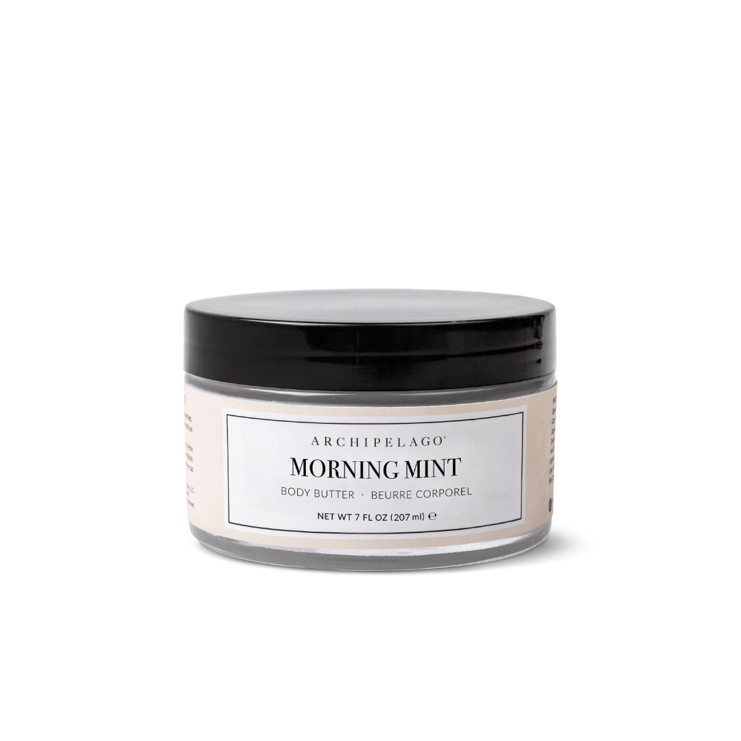 A 7 fl oz (207 ml) jar of Morning Mint Body Butter with a black lid and white label, enriched with essential oils for deep hydration. - image 1