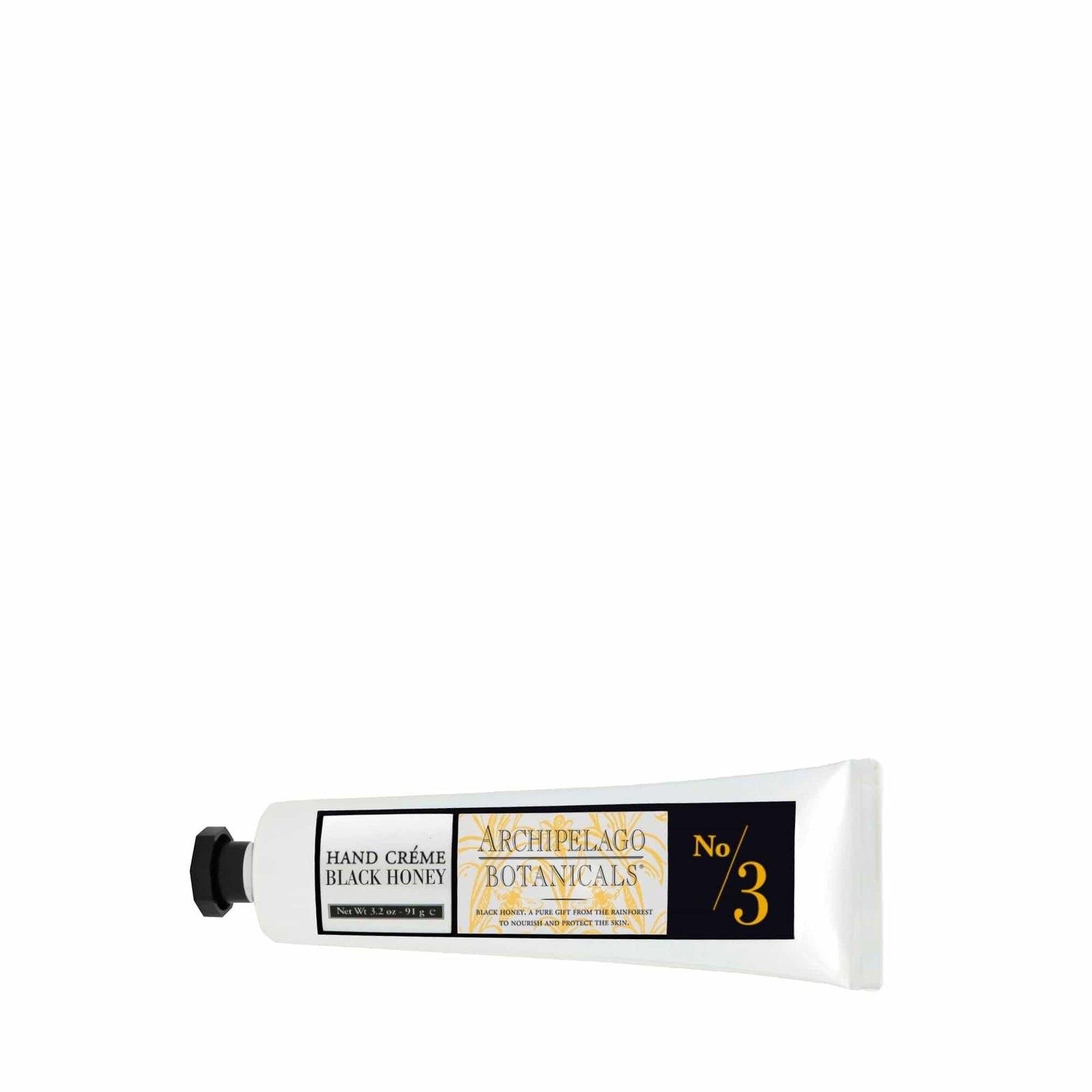 A tube of Black Honey Hand Creme, positioned horizontally on a white background, ideal for nourishing your skin and offering essential cuticle care. - image 3
