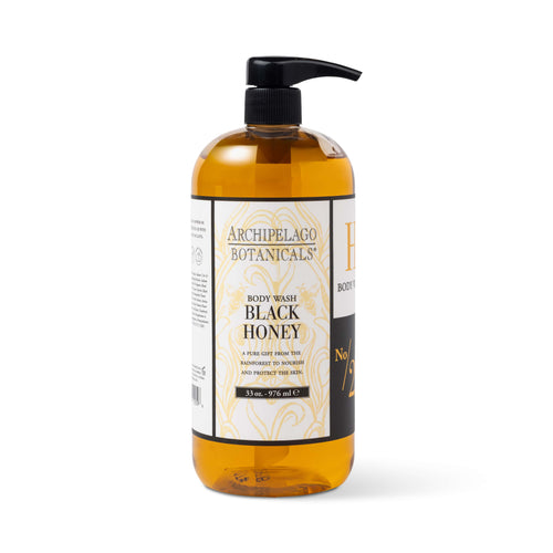 A clear pump bottle of Black Honey 33 oz. Body Wash, a hydrating cleanser featuring a black label with gold accents, shown on a white background.