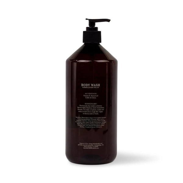 A large brown bottle of Botanico de Havana Body Wash with a black pump dispenser and a label detailing ingredients and usage instructions.