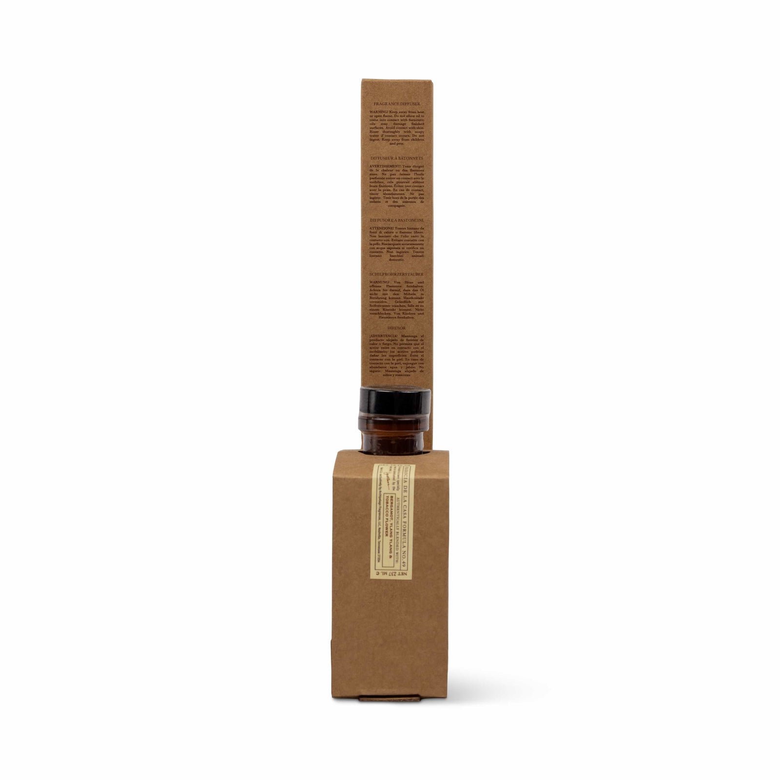 Botanico de Havana Reed Diffuser in an amber glass bottle, housed in a brown cardboard box with extensive multilingual warning text printed on an extended tab. - image 5