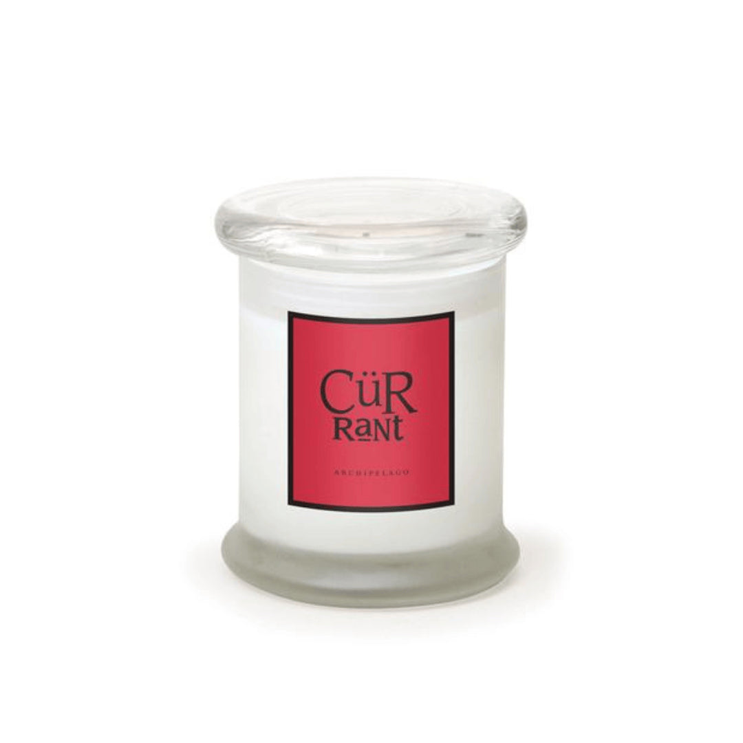The Currant Frosted Jar Candle features a fruity white currant scent in a clear glass jar with a wide, flat lid and a red label printed with "CÜR Rant" and "ARCHIPELAGO" in black and gold text—perfect for any space.1