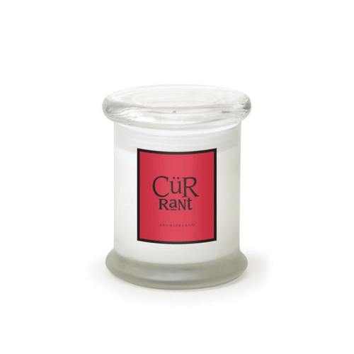 The Currant Frosted Jar Candle features a fruity white currant scent in a clear glass jar with a wide, flat lid and a red label printed with "CÜR Rant" and "ARCHIPELAGO" in black and gold text—perfect for any space.