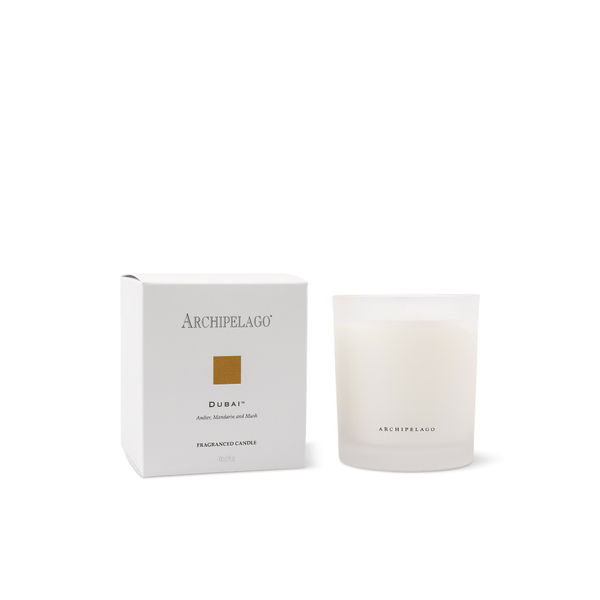 Archipelago Dubai Petite Candle and packaging on a white background.