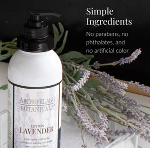 A bottle of Lavender Body Lotion sits on a white tray with sprigs of lavender behind it. Infused with essential oils, this moisturizing lotion is made with simple ingredients—no parabens, no phthalates, and no artificial color.2