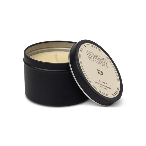 Black candle tin with a lid featuring 'Archipelago Botanicals' on a white background