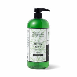 A 33 oz. bottle of Morning Mint Body Wash with a black pump, green leafy design, and refreshing wild mint scent.1