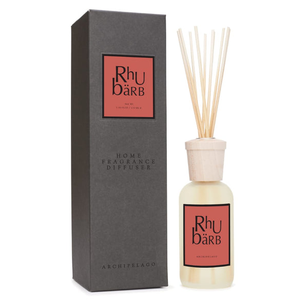 The Rhubarb Reed Diffuser features wooden reeds and a sleek black box, both displaying a pink label with "Rhubarb" in bold and the Archipelago brand name at the bottom.