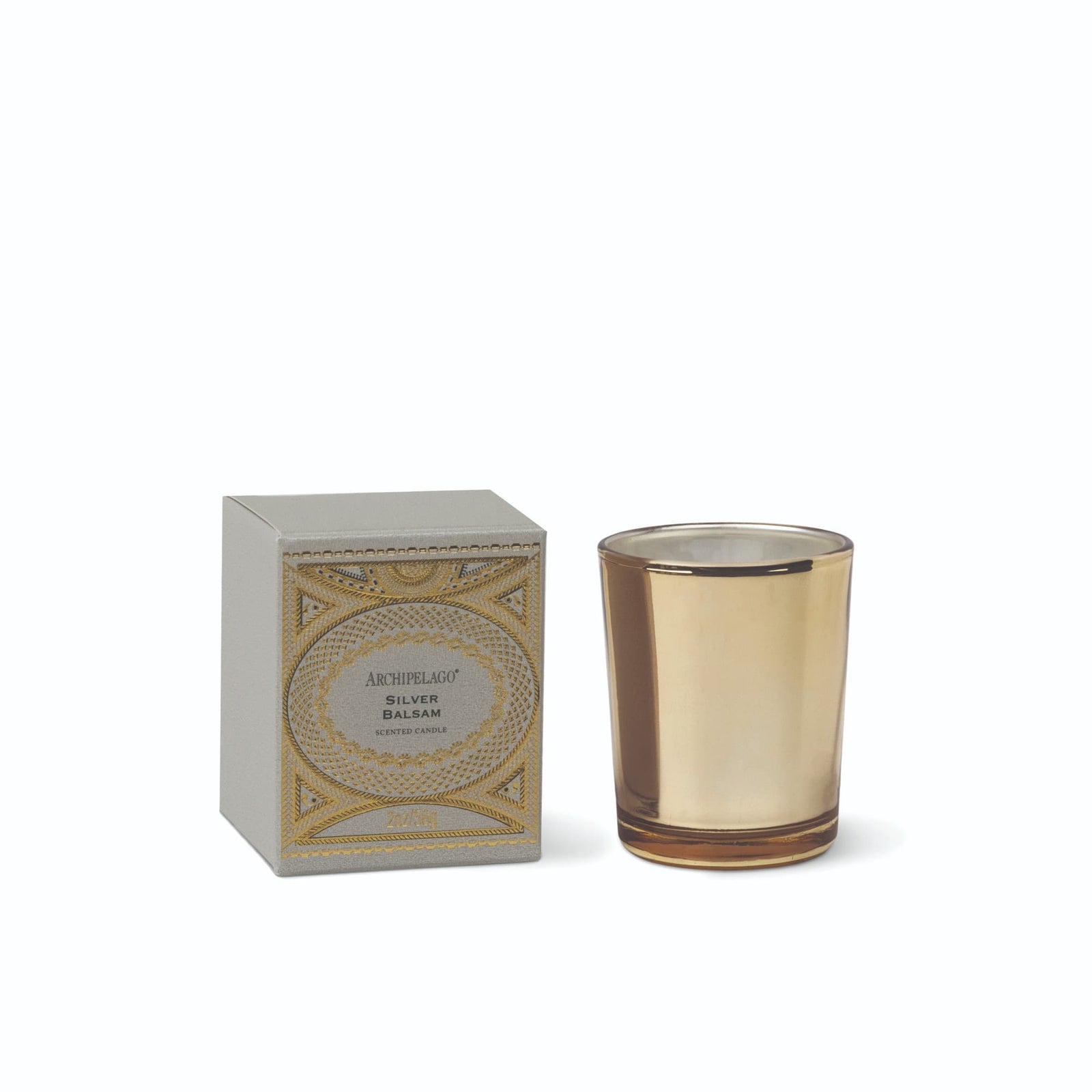 A square box with intricate gold-toned pattern designs next to a Silver Balsam Petite Candle gold glass vessel. - image 1